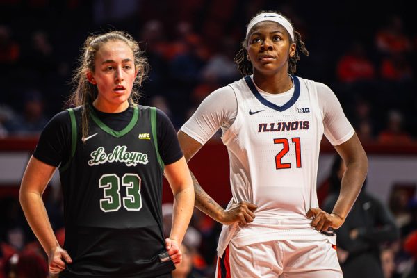 Freshman forward Naomi Benson looks up toward the rim during Illinois’ game against Le Moyne on Nov. 30, 2025. Illinois went on to win the game 100-28.