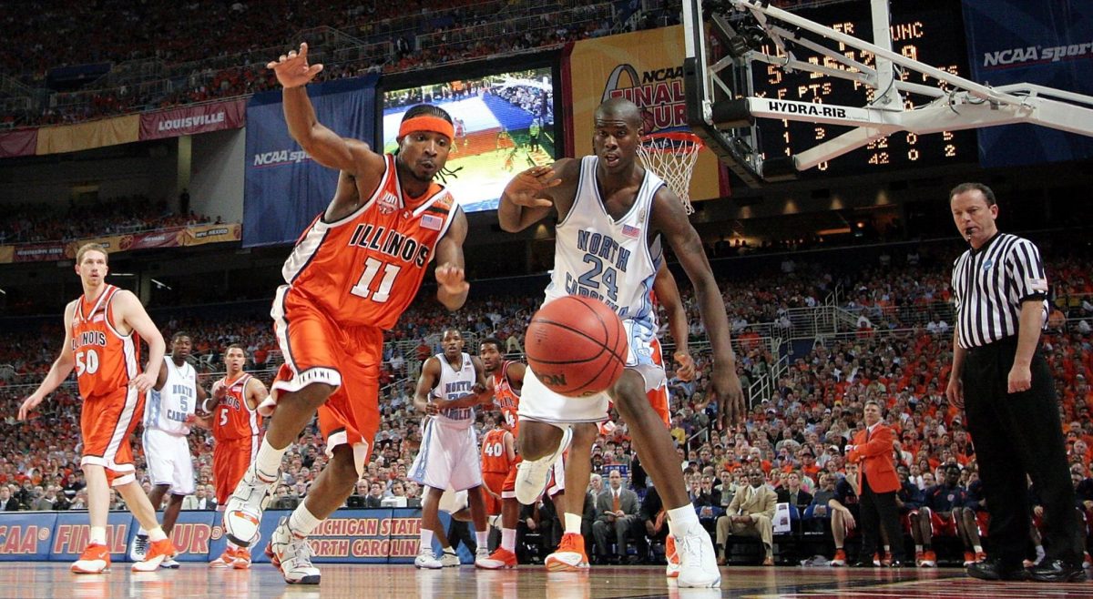 Illinois’ Dee Brown, left, and North Carolina’s Marvin Williams run after a loose ball during the Men’s 2005 NCAA championship game in St. Louis Monday, April 4, 2005.