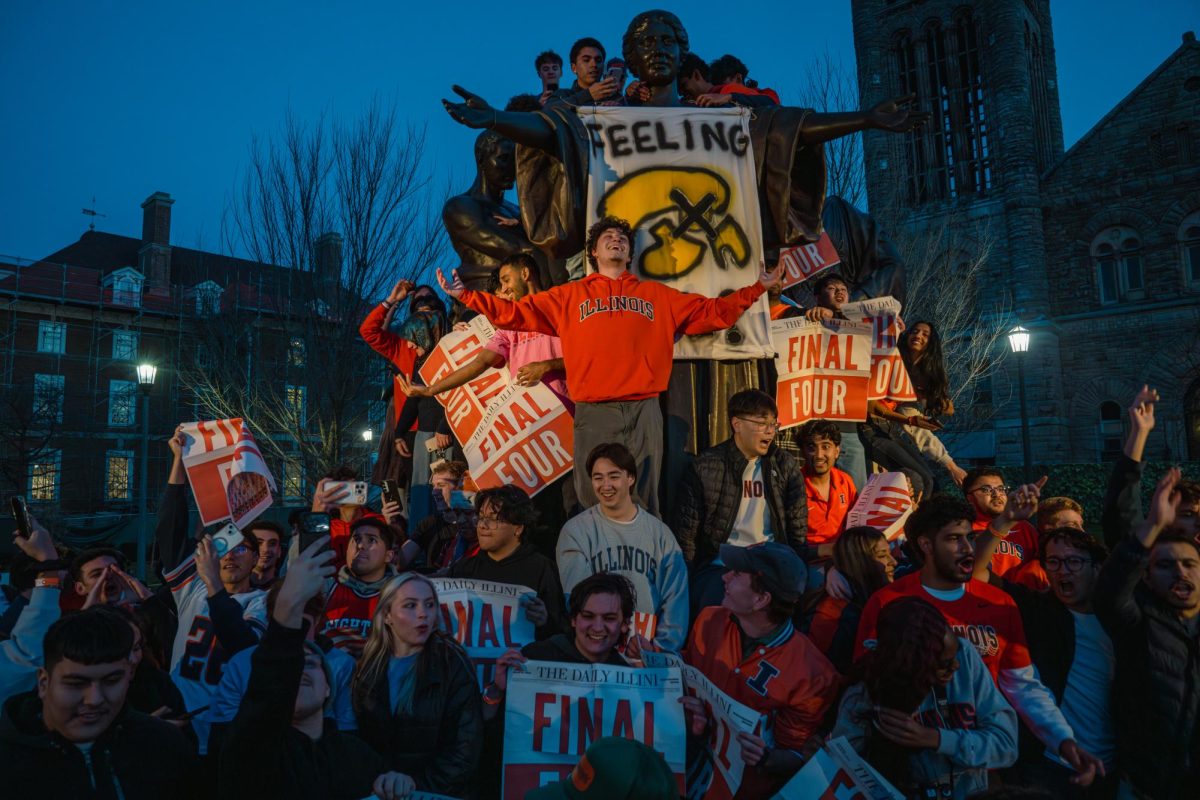 Illinois fans celebrate on Alma Mater after Illinois beat Iowa to advance to the Final Four.