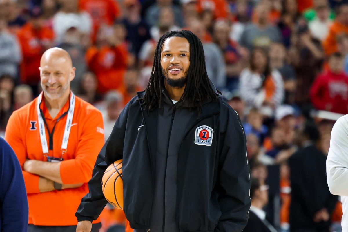 Redshirt junior guard/forward Ty Rodgers smiles during Illinois’ open practice at Lucas Oil Stadium on April 3 in Indianapolis.