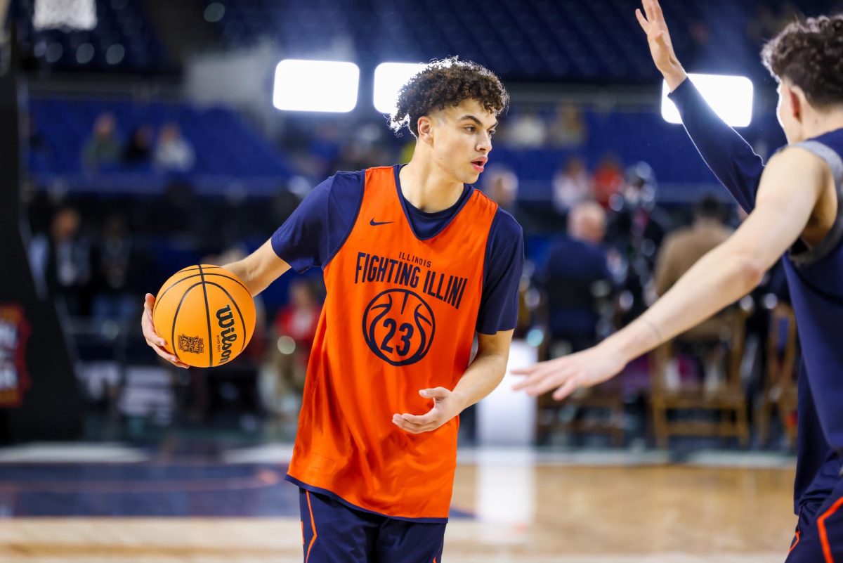 Freshman guard Keaton Wagler handles the ball during Illinois' open practice at Lucas Oil Stadium on April 3, one day before its Final Four game against UConn.