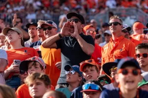 Illinois fans cheer on the team Monday at the ReliaQuest Bowl in Tampa, Fla.