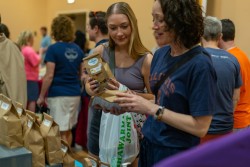 Lucy Henrikson, junior in AHS, and her mother, Lynette Henrikson, browsed through some homemade dog treats.