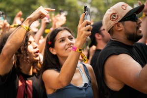 A crowd member records some of Skrillex’s set.
