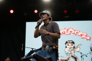 grentperez singing passionately to the audience.