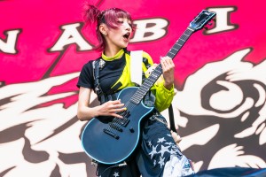 Matsuri on guitar as she plays alongside the rest of HANABIE.