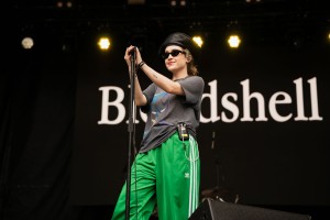 Blondshell smiles as she begins her performance for Lollapalooza.