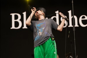 Blondshell displays her vocals during her set.