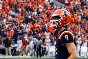 Senior quarterback Luke Altmyer warms up before the Illinois versus Western Michigan game on Sept. 13. 2025.