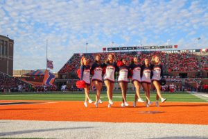 Cheerleaders celebrate between quarters with the Can-can dance on the field at Gies Memorial Stadium on Nov. 15, 2025.