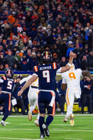 Senior quarterback Luke Altmeyer points upward between plays at the game versus Tennessee on Dec. 30, 2025. Altmeyer went on to win the game's MVP award.