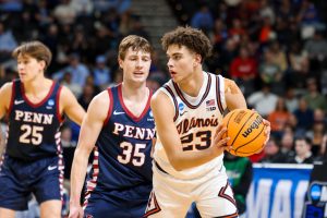 Illinois freshman guard Keaton Wagler is defended by Penn junior guard/forward Niklas Polonowski during the teams’ first-round NCAA tournament game March 19 in Greenville, South Carolina.