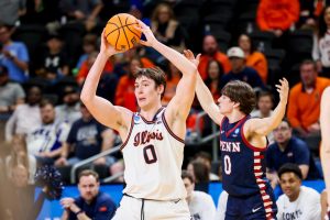 Freshman forward David Mirković looks to pass the ball during the second half of Illinois’ NCAA tournament win over Penn March 19 in Greenville, South Carolina.