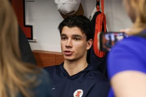 Junior wing Andrej Stojaković speaks with the media in Illinois’ locker room at Bon Secours Wellness Arena March 20 to preview the matchup with VCU.