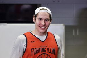Freshman forward David Mirković smiles in the Illinois locker room after speaking with the media March 20, one day after his 29-point, 17-rebound March Madness debut.