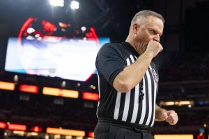 Official Paul Szelc heads off the court before the Illinois versus UConn Final Four game on April 4.