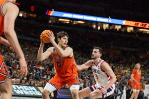 Freshman forward David Mirkovic takes the ball after a possession change.