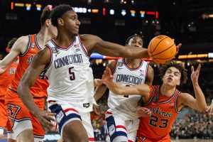 UConn senior center Tarris Reed Jr. grabs an offensive rebound.