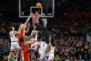 Junior center Zvonimir Ivisic attempts to tip the ball into the net.