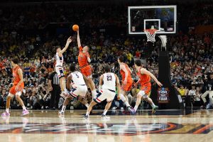 Graduate student forward Ben Humrichous blocks a shot attempt by UConn freshman guard Braylon Mullins.