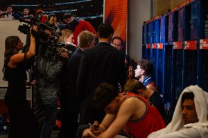 Freshman guard Keaton Wagler talks to the press in the locker room after Illinois' loss. Wagler led Illinois in scoring with 20 points.