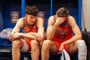 Junior centers Zvonimir and Tomislav Ivisic sit and talk in the locker room following Illinois' season-ending Final Four loss.